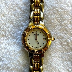 Genuine Fendi ladies gold and silver link watch. Bought at Fendi boutique in HI